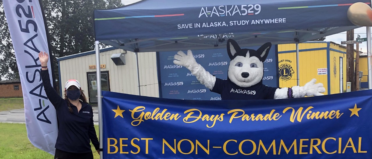 Alaska 529 Booth With Golden Days Parade Winner Banner